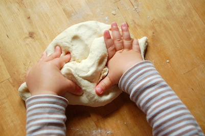 Child Playing in Dough